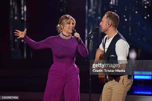 Beatrice Egli and swiss singer Marco Kunz on stage during the recording of German Swiss TV show "Die Beatrice Egli Show" at Studio Berlin on October...