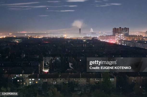 Photograph shows a view of Kyiv late on October 11, 2022 during a rolling blackout of parts of districts of the Ukrainian capital following rocket...