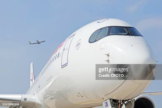 Air China and China Eastern passenger planes are seen at Yantai Penglai International Airport, Shandong province, China, Sept 1, 2022. The global...