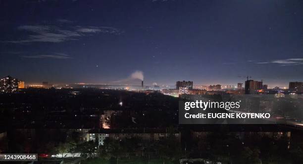 Photograph shows a view of Kyiv late on October 11, 2022 during a rolling blackout of parts of districts of the Ukrainian capital following rocket...