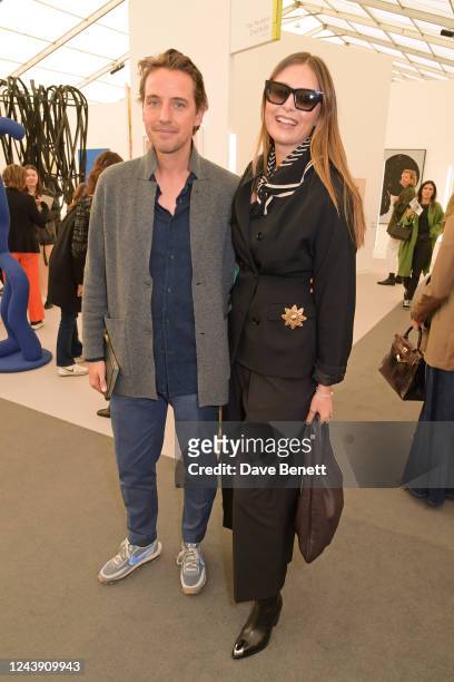 Co-founder of Squared Circles Alexander Gilkes and Maria Sharapova attend the Frieze Art Fair 2022 VIP Preview in Regent's Park on October 12, 2022...