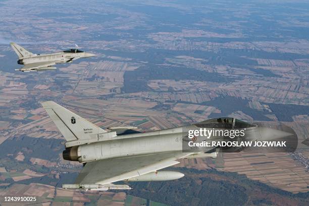 Eurofighter jets take part in the NATO Air Shielding exercise near the air base in Lask, central Poland on October 12, 2022.