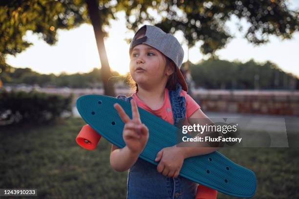 true peace is when i ride my skateboard - skater girl stock pictures, royalty-free photos & images