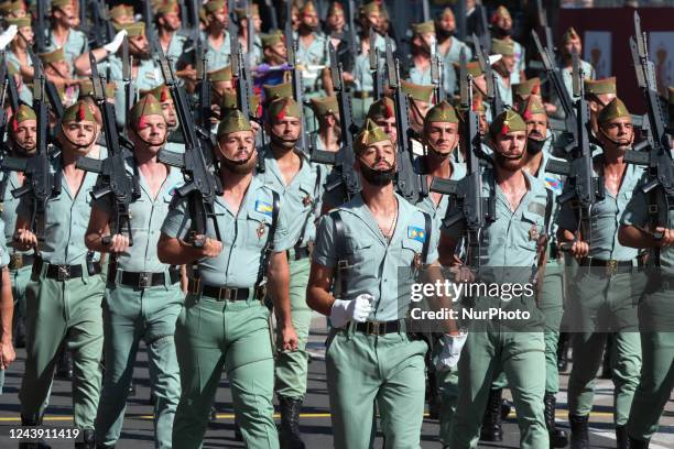 Troops march during a military parade on the national holiday known as &quot;Dia de la Hispanidad&quot; or Hispanic Day in Madrid, Spain, Oct. 12,...