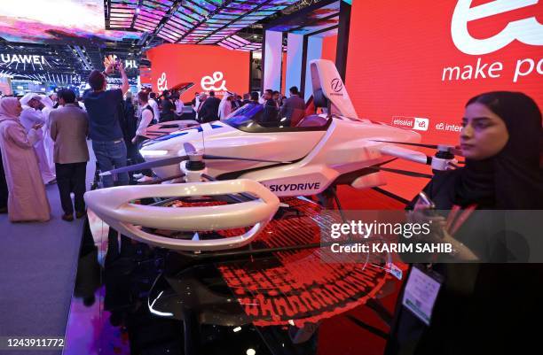 SkyDrive's flying vehicle is on display during the GITEX Global technology show at the Dubai World Trade Centre in the Gulf emirate, on October 12,...