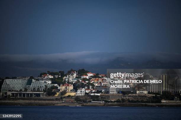 The city of Cascais is pictured from the 'Santa Maria Manuela' sailboat on October 9, 2022. - A team of scientists aboard the sailboat 'Santa Maria...