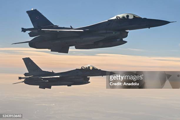 Raftor F22 from US Air Force, F 16 fighter jets and MIG 29 of the Polish Air Force take part in a NATO Air Force military drill on October 12, 2022...
