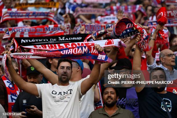 Fans cheer before the UEFA Champions League 1st round, group B, football match between Club Atletico de Madrid and Club Brugge at the Wanda...