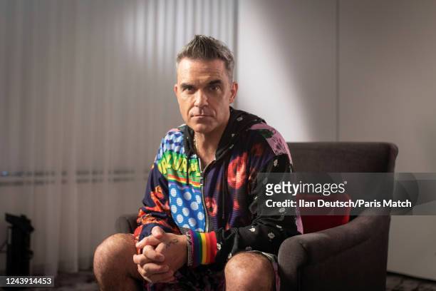 Singer Robbie Williams is photographed for Paris Match on September 4, 2022 in Geneva, Switzerland.