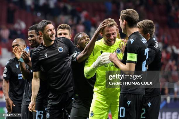 Club Brugge's Belgian goalkeeper Simon Mignolet is congrarulated by teammates at the end of the UEFA Champions League 1st round, group B, football...