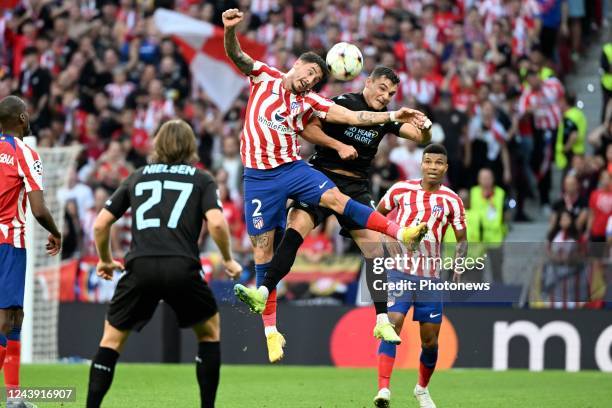 Gimenez Jose Maria defender of Atlectico Madrid & Jutgla Ferran forward of Club Brugge during the UEFA Champions League Group Stage B Matchday 4...