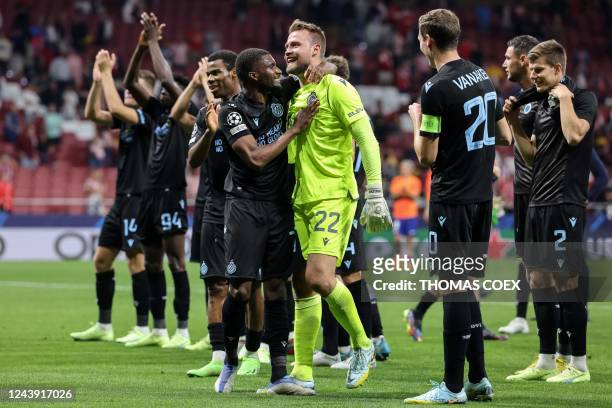 Club Brugge's Belgian goalkeeper Simon Mignolet is congrarulated by teammates at the end of the UEFA Champions League 1st round, group B, football...