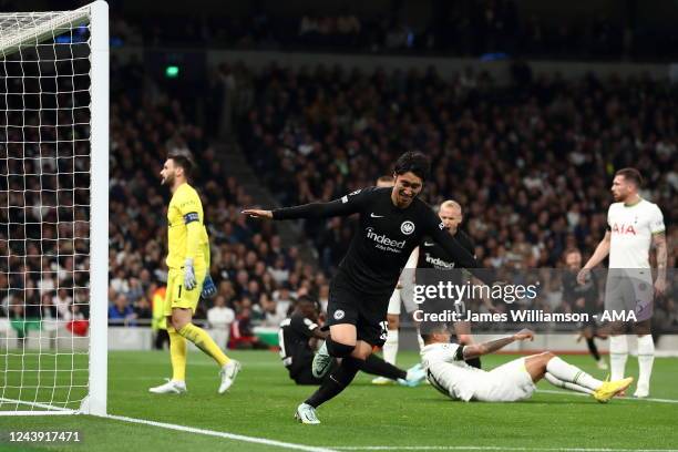 Daichi Kamada of Eintracht Frankfurt celebrates after scoring a goal to make it 0-1 during the UEFA Champions League group D match between Tottenham...