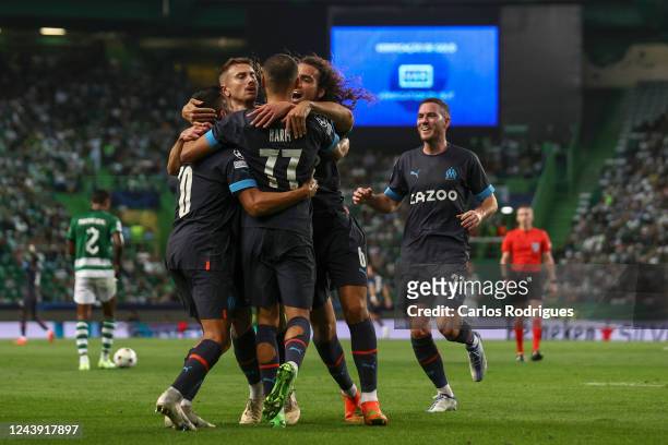 Alexis Sanchez of Olympique Marseille celebrates scoring Olympique Marseille second goal with his team mates during the UEFA Champions League group D...