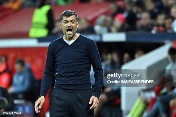 Porto's Portuguese head coach Sergio Conceicao reacts during the UEFA Champions League Group B football match between Bayer 04 Leverkusen and FC...