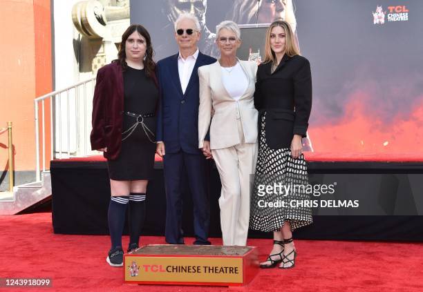 Actress Jamie Lee Curtis stands for a photo with her husband Christopher Guest, and her daughters Ruby and Annie , during her hand and footprint...
