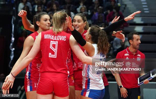 Serbia's Brankica Mihajlovic and team mates react during the Women's Volleyball World Championships semi-final match between Serbia and USA in...