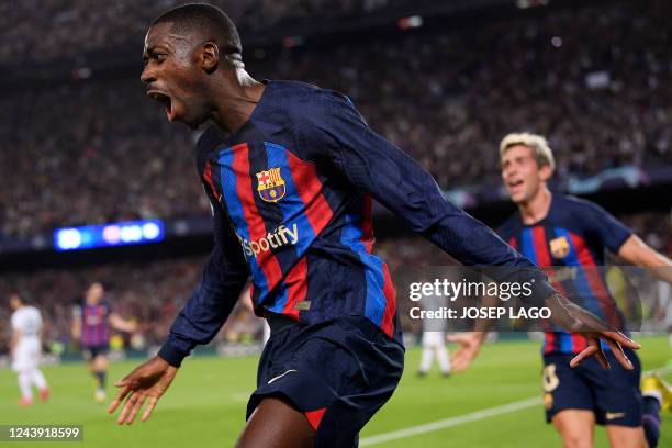 Barcelona's French forward Ousmane Dembele celebrates scoring the opening goal during the UEFA Champions League 1st round, group C, football match...