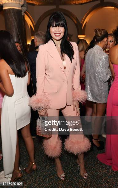 Daisy Lowe attends the Nadine Merabi Fashion Week show at Battersea Arts Centre on October 12, 2022 in London, England.