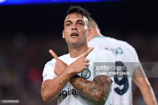 Inter Milan's Argentinian forward Lautaro Martinez celebrates scoring his team's second goal during the UEFA Champions League 1st round, group C,...