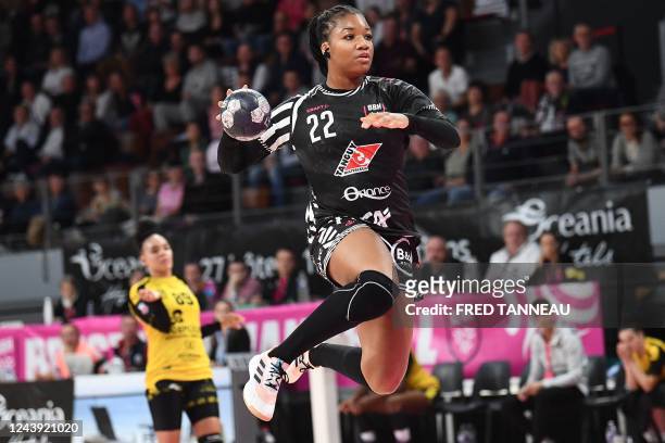 Brest's centre back Pauleta Foppa shoots the ball during the French handball match between Brest and Plan-de-Cuques at the Arena Stadium in Brest,...