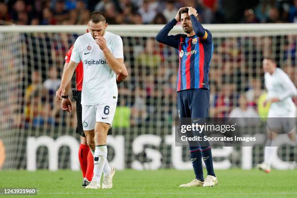 Gerard Pique of FC Barcelona Stefan de Vrij of FC Internazionale during the UEFA Champions League match between FC Barcelona v Internazionale at the...