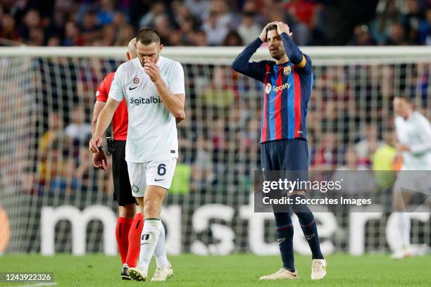 Gerard Pique of FC Barcelona Stefan de Vrij of FC Internazionale disappointed during the UEFA Champions League match between FC Barcelona v...