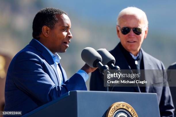 Rep. Joe Neguse stands with U.S. President Joe Biden as he gives a speech before Biden designates Camp Hale as a national monument on October 12,...