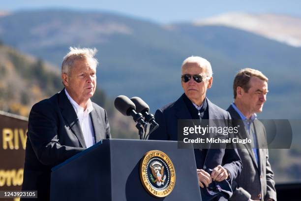 Secretary of Agriculture Tom Vilsack speaks at Camp Hale while standing with U.S. President Joe Biden and Sen. Michael Bennett before Biden...