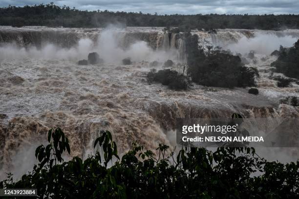 Picture of the Iguacu falls -considered as one of the largest waterfalls in the world- as seen from the Brazilian side on the border with Argentina,...