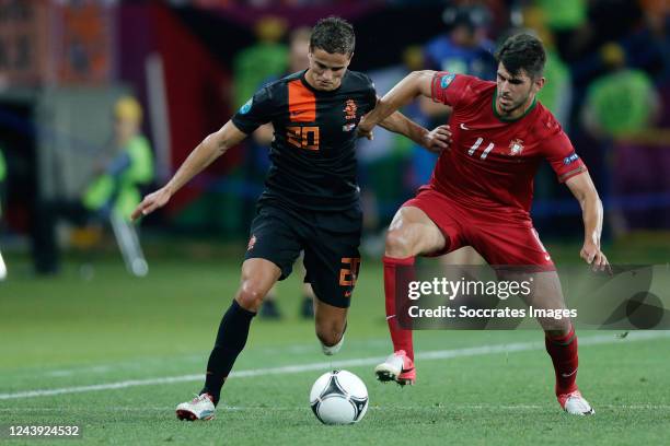 Ibrahim Afellay of Holland, Nelson Oliveira of Portugal during the EURO match between Portugal v Holland on June 17, 2012