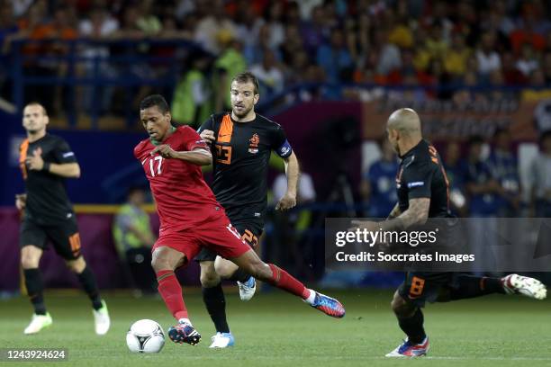 Rafael van der Vaartof Holland, Nani of Portugal during the EURO match between Portugal v Holland on June 17, 2012