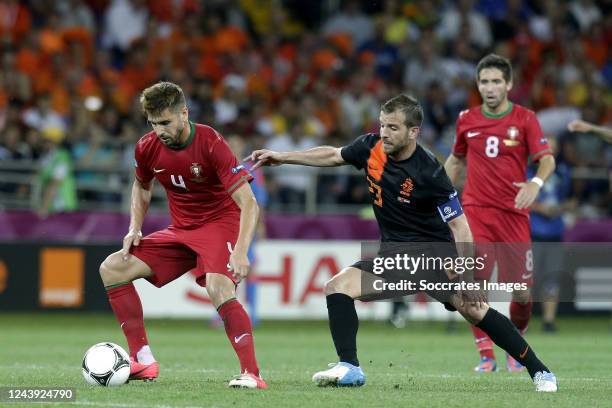 Rafael van der Vaartof Holland, Miquel Veloso of Portugal during the EURO match between Portugal v Holland on June 17, 2012