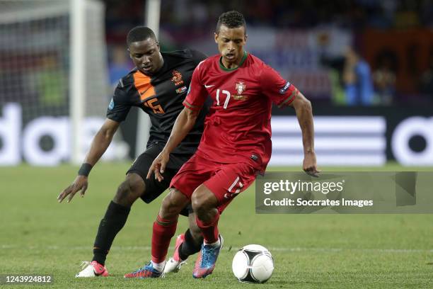 Jetro Willems of Holland, Nani of Portugal during the EURO match between Portugal v Holland on June 17, 2012