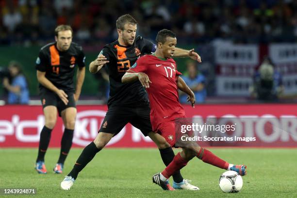 Rafael van der Vaartof Holland, Nani of Portugal during the EURO match between Portugal v Holland on June 17, 2012