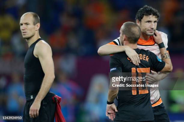 Wesley Sneijder of Holland, Arjen Robben of Holland, Mark van Bommel of Holland disappointed during the EURO match between Portugal v Holland on June...
