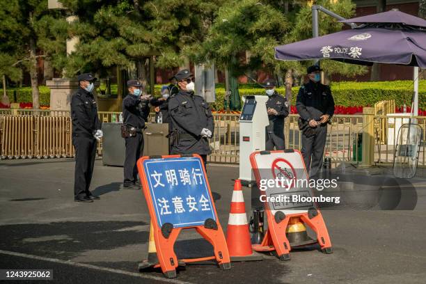 Police officers stand guard near Tiananmen Square ahead of the Communist Party congress in Beijing, China, on Wednesday, Oct. 12, 2022. Chinese...