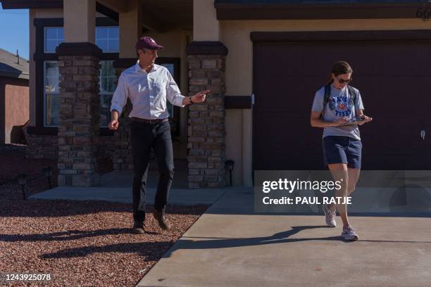 Texas Democratic gubernatorial candidate Beto O'Rourke canvasses with his wife Amy Hoover Sanders in El Paso, Texas on October 12, 2022.