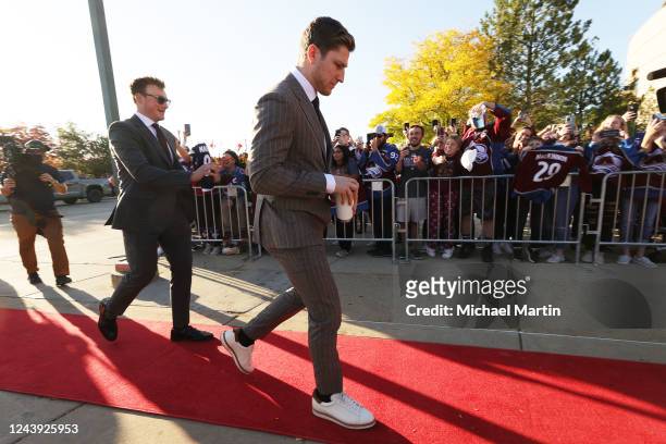 Cale Makar and Nathan MacKinnon of the Colorado Avalanche of the Colorado Avalanche enter Ball Arena prior to the game against the Chicago Blackhawks...