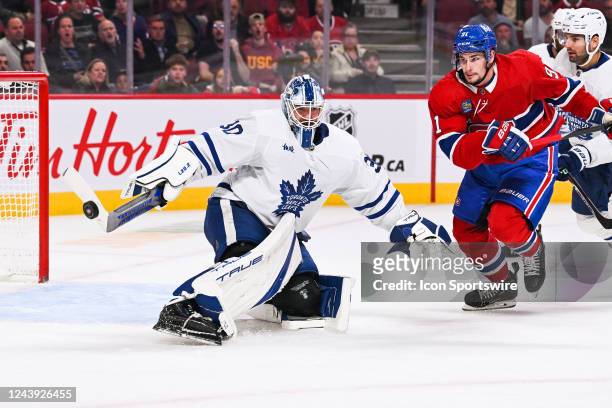 Toronto Maple Leafs goalie Matt Murray makes a save over Montreal Canadiens center Sean Monahan during the Toronto Maple Leafs versus the Montreal...