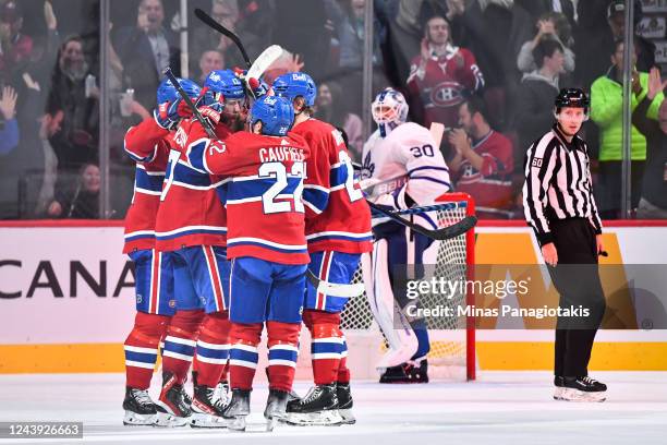 Josh Anderson of the Montreal Canadiens celebrates his goal with teammates during the third period against the Toronto Maple Leafs at Centre Bell on...