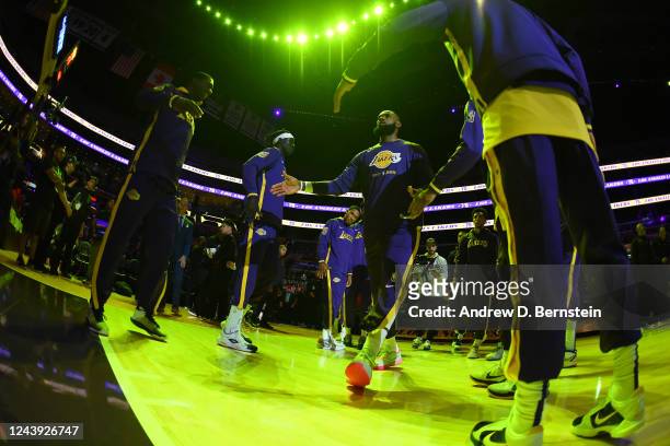 Lebron James of the Los Angeles Lakers runs onto the court before the game against the Minnesota Timberwolves on October 12, 2022 at Crypto.com Arena...