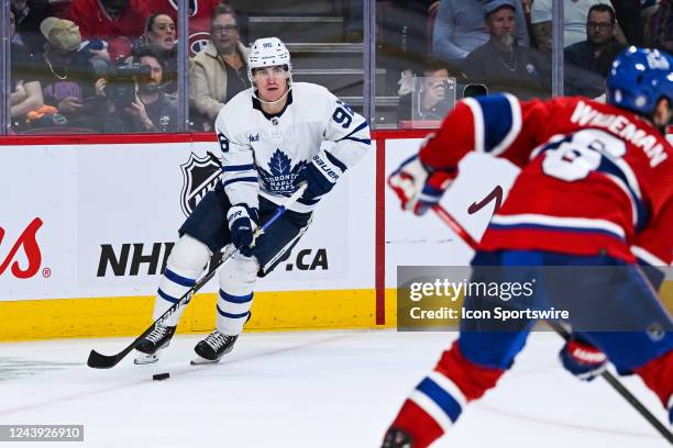 Toronto Maple Leafs right wing Nicolas Aube-Kubel plays the puck during the Toronto Maple Leafs versus the Montreal Canadiens game on October 12 at...