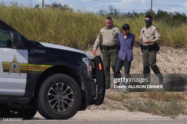 Webb County Sheriffs Officer and US Border Patrol arrest a man smuggling migrants in a vehicle on October 12, 2022 in Laredo, Texas