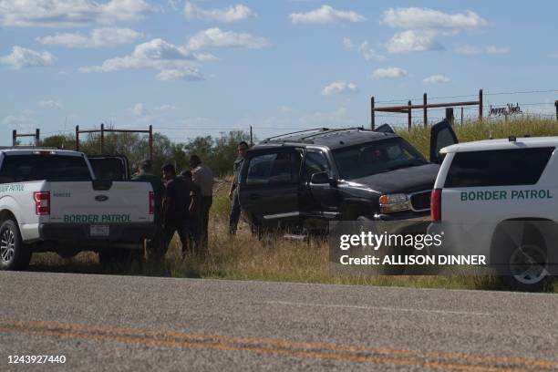 Border Patrol and the Webb County Sheriff stop a vehicle smuggling migrants on October 12, 2022 in Laredo, Texas.