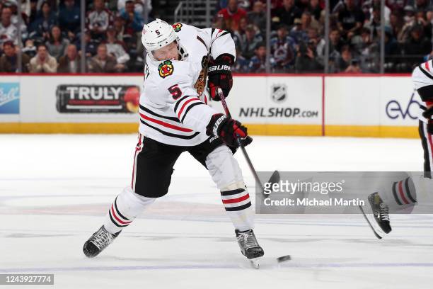 Connor Murphy of the Chicago Blackhawks takes a shot against the Colorado Avalanche at Ball Arena on October 12, 2022 in Denver, Colorado.