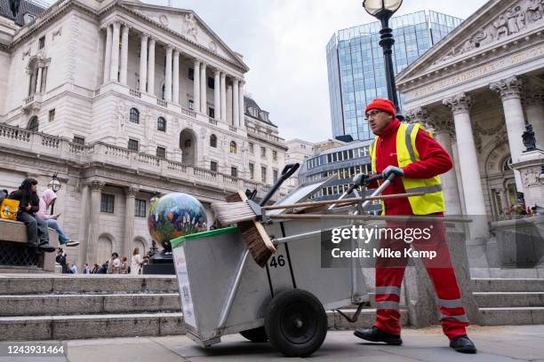 Street sweeper goes about his work near the Bank of England in the City of London on 12th October 2022 in London, United Kingdom. Turmoil in...