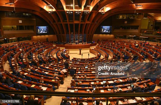 Ukrainian President Volodymyr Zelenskyy addresses members of parliament via live video feed at the Council of Europe in Strasbourg, France on October...