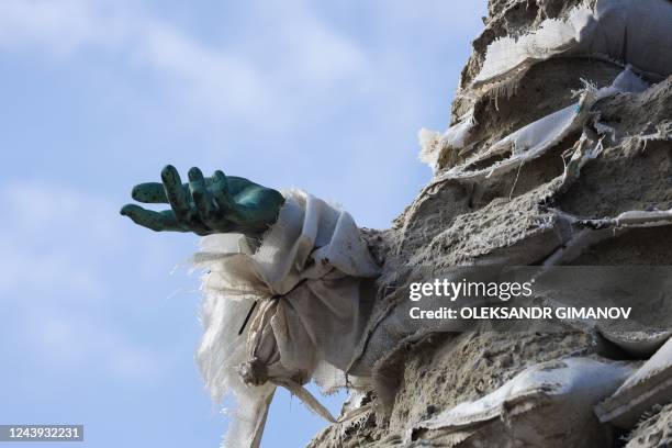 This photograph shows a fragment of Statue of the Duke of Richelieu covered with sand sacks in Ukrainian city of Odessa on October 13, 2022. -...