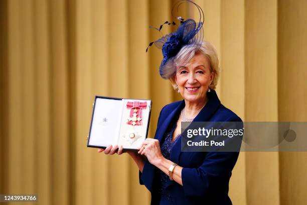 Dame Andrea Leadsom poses after being made a Dame Commander of the British Empire for services to politics by the Prince of Wales during an...